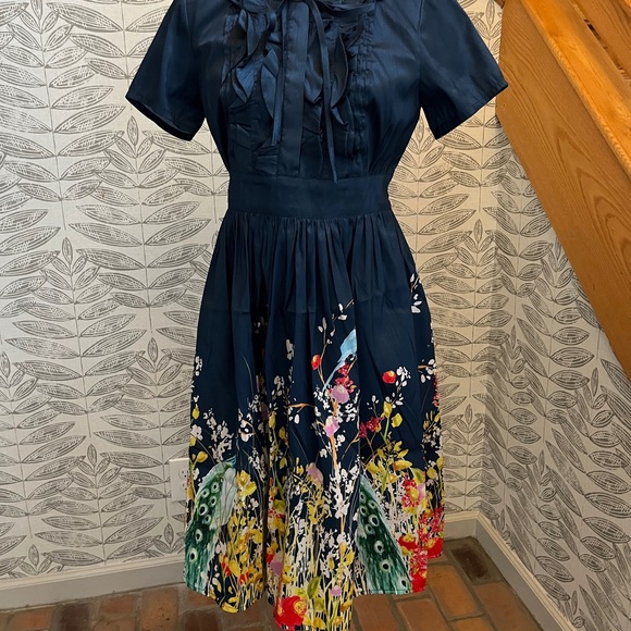 eshakti Dresses & Skirts - Navy Floral Peplum Midi Dress with Ribbon Tie